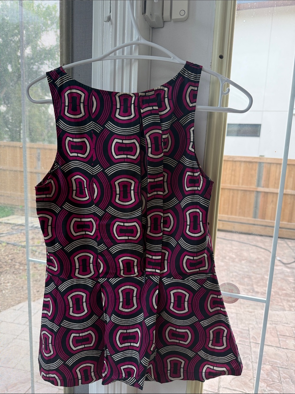 Sleeveless Pink Geometric peplum top